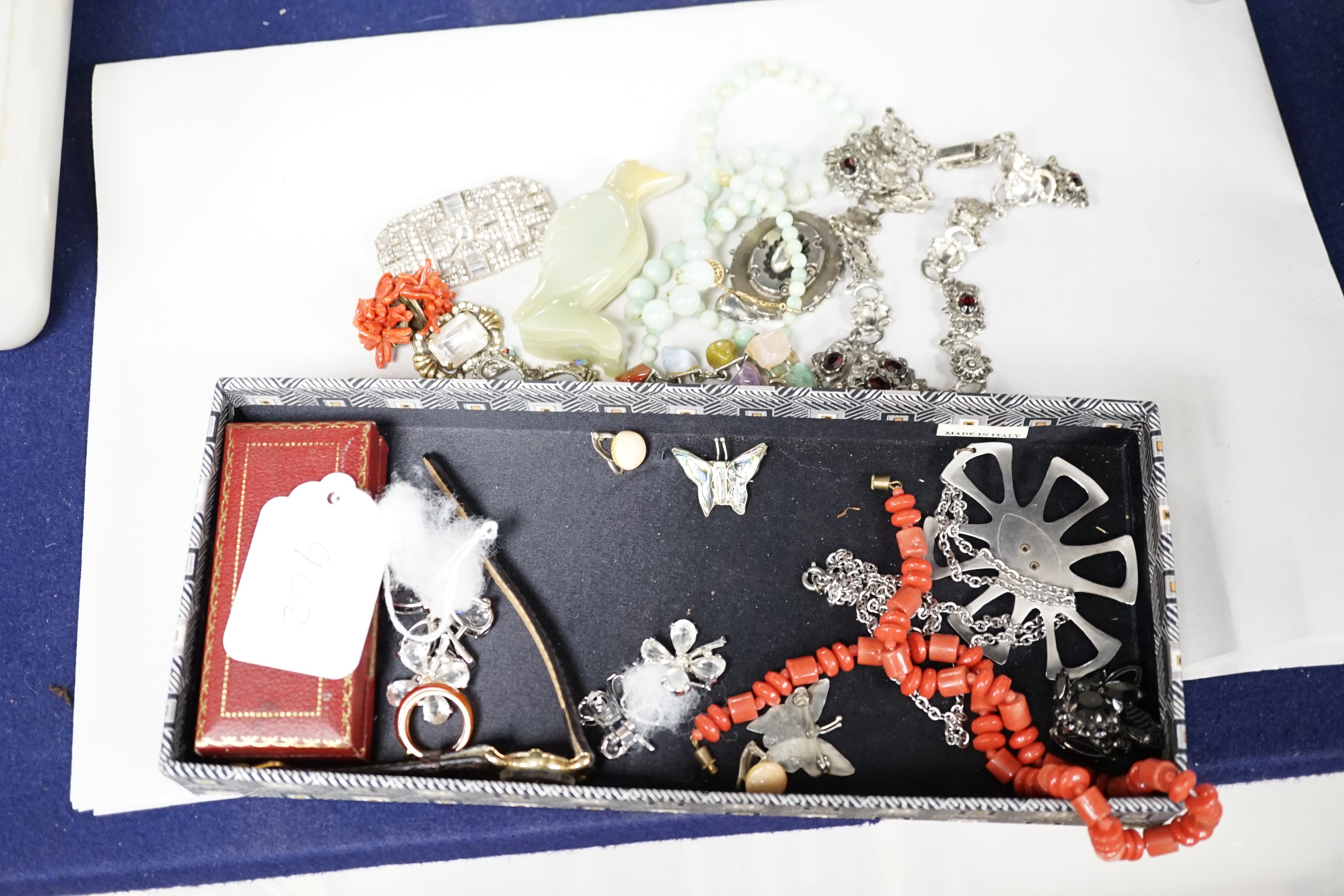 A quantity of assorted jewellery including necklaces, paste set costume, a Victorian white metal locket, hardstone bracelet etc. Condition - poor to fair